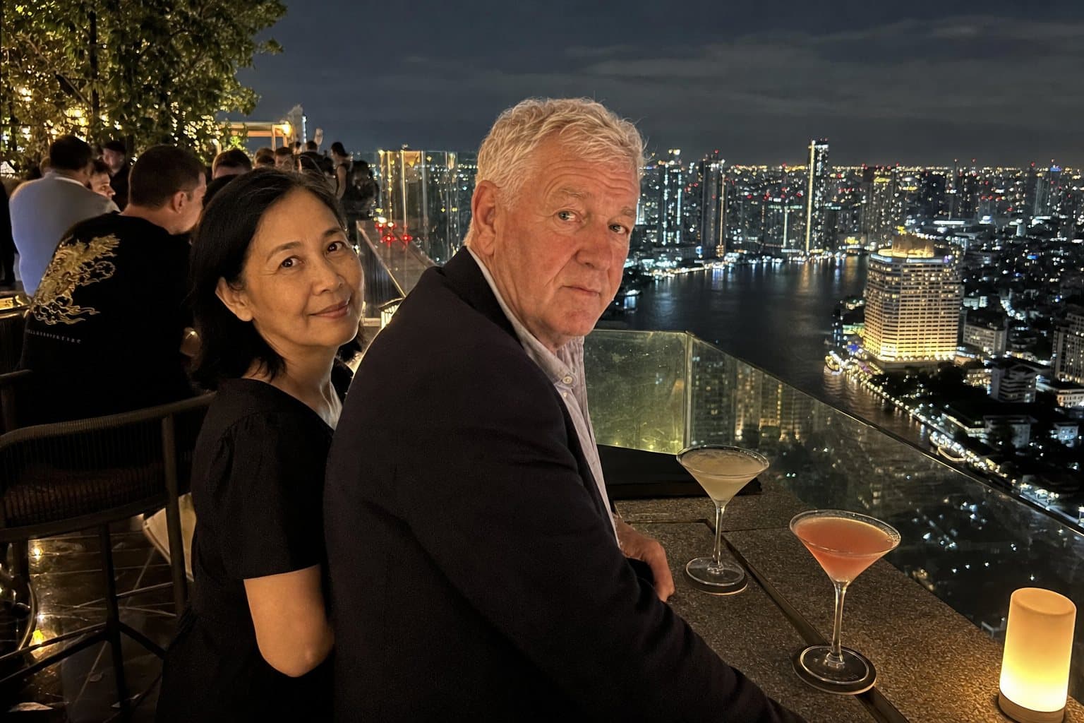 Tim and Nok at a Bangkok rooftop bar